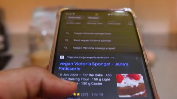Vegan Recipe Being Searched Mobile Phone — Vídeo de Stock