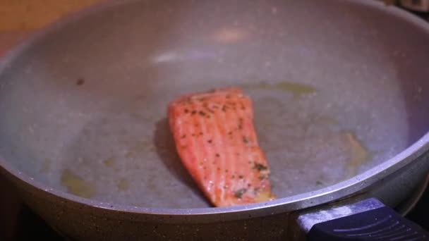 Ethnic Woman Pan Frying Salmon Pan Spatula — Stockvideo