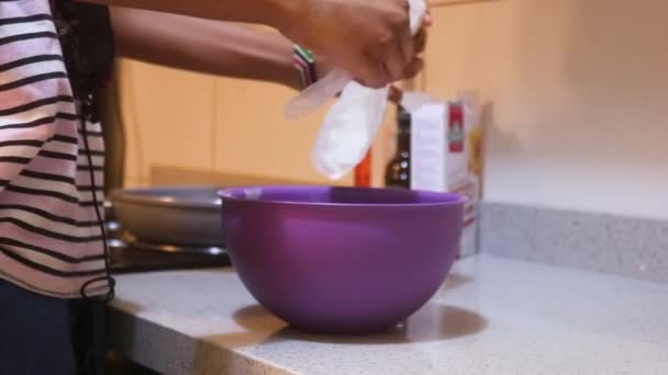 Pancake Mix Being Poured Bowl Ethnic Woman Side View — Stock Video