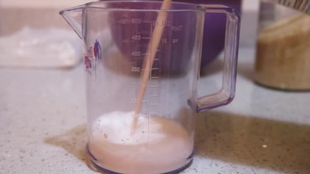 Pancake Mix Milk Being Measured Ethnic Woman — Stock Video