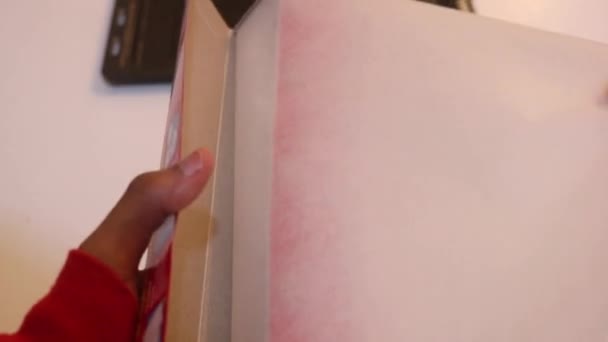 Woman Hand Tearing Baking Sheet — Vídeo de Stock