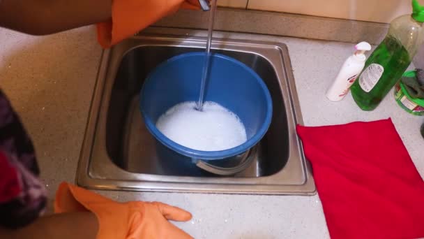 Young Woman Filling Bucket Soap Water High Angle — Stock Video
