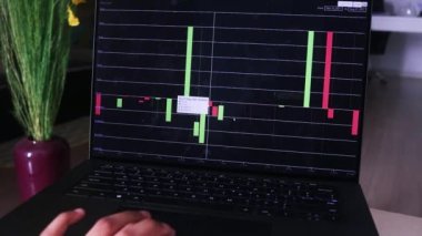 African Woman Checking Tether Stock Chart In Her Living Room