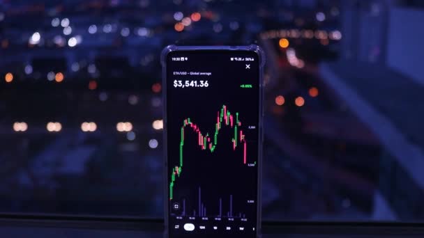 Mobile Phone Displaying Real Time Ethereum Stock City Night View — Αρχείο Βίντεο