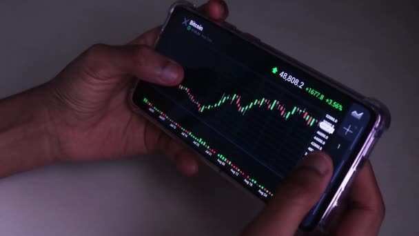 Woman Checking Bitcoin Stock Chart Horizontal Mode — Wideo stockowe