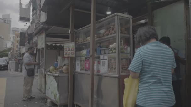 Malaysian Woman Serving Chinese Customer Raw — Stock Video