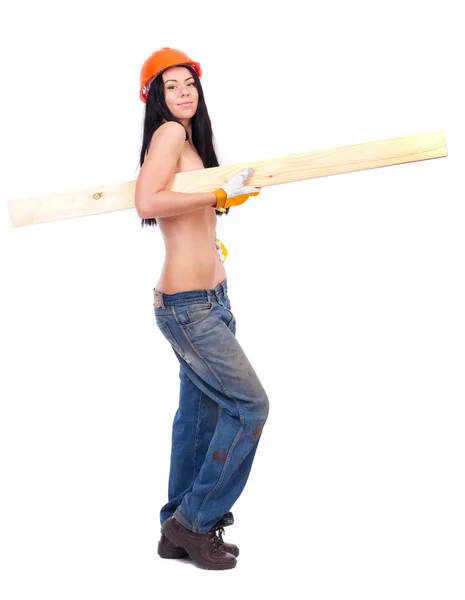 Topless girl in working clothes in the orange helmet — Stock Photo, Image