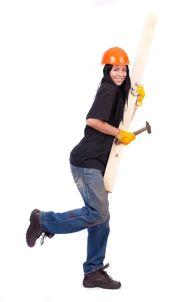 Chica en ropa de trabajo en el casco naranja — Foto de Stock