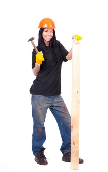 Chica en ropa de trabajo en el casco naranja — Foto de Stock