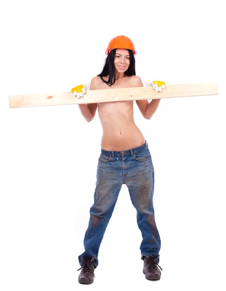 Topless girl in working clothes in the orange helmet — Stock Photo, Image