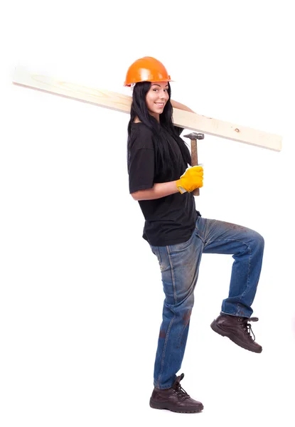 Chica en ropa de trabajo en el casco naranja — Foto de Stock