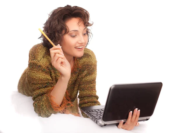 Laughing girl with laptop on a white background — Stock Photo, Image