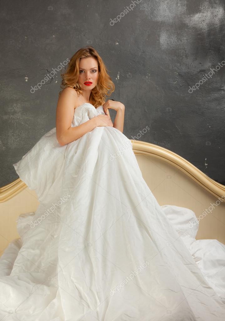 Blonde naked in bed — Stock Photo © Oshepkov1962 #32641581