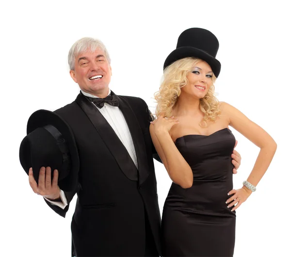 Man and woman in elegant suits and hats — Stock Photo, Image