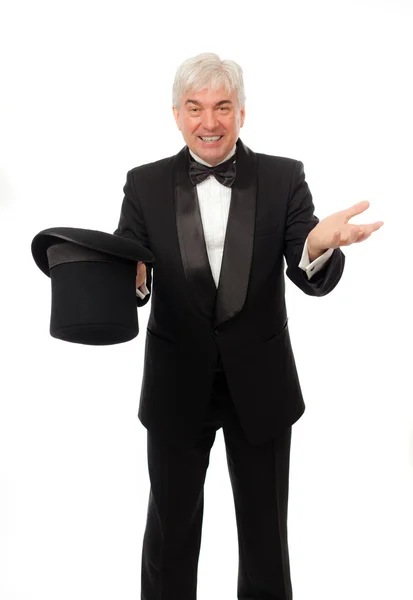 Elegant man in tuxedo and top hat a white background — Stock Photo, Image