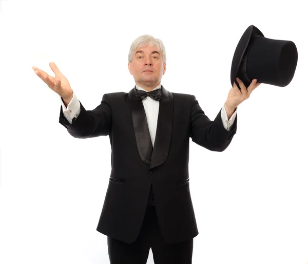 Elegant man in tuxedo and top hat a white background — Stock Photo, Image