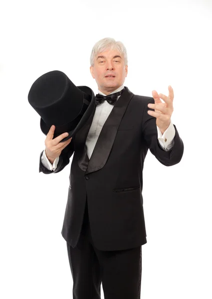 Elegancki mężczyzna w smokingu i top hat białe tło — Zdjęcie stockowe