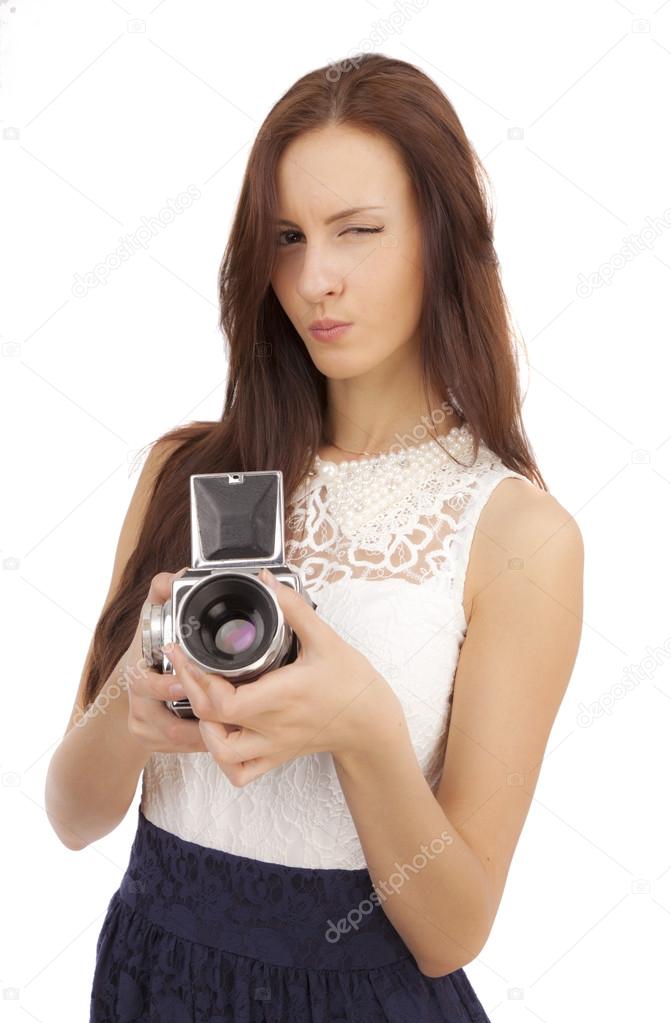 Girl with an old camera