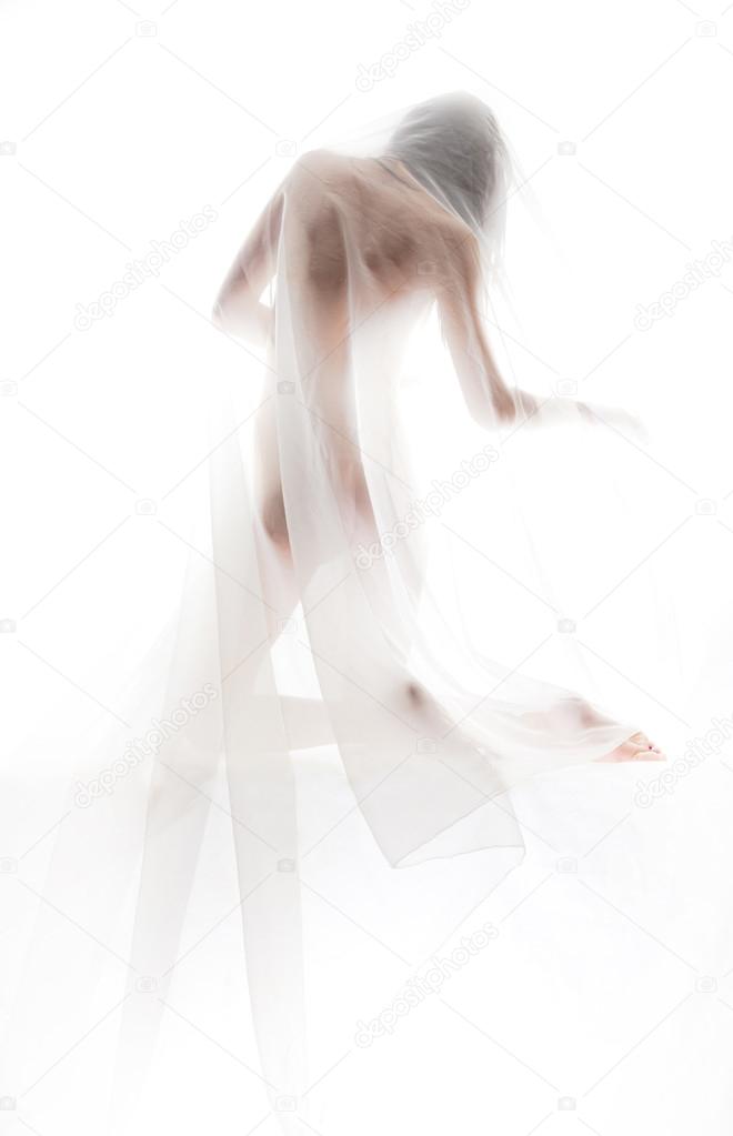 Naked girl covered with transparent cloth