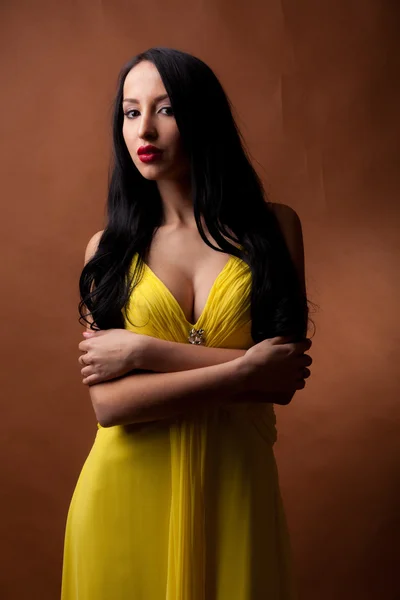 Girl in a yellow dress — Stock Photo, Image