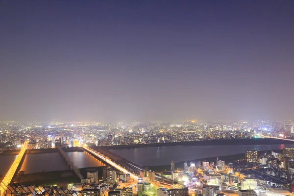 O horizonte de Osaka à noite — Fotografia de Stock