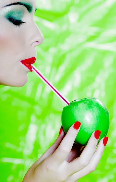 Woman portrait drinking apple juice — Stock Photo, Image