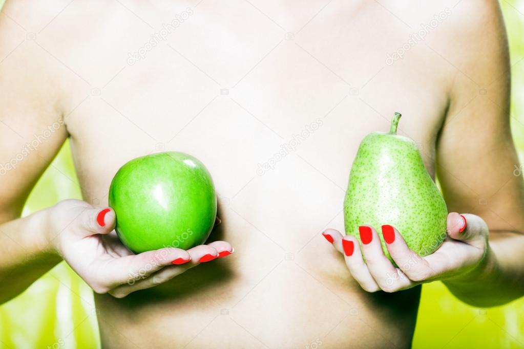 Woman pear and apple breast concept Stock Photo by ©STYLEPICS 13654317