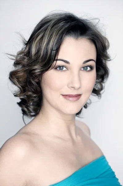 Studio shot portraits of a young beautiful and cute smiling woman — Stock Photo, Image