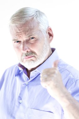 Senior man portrait thumb up