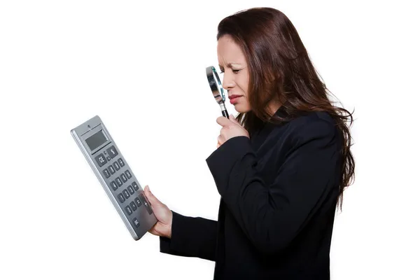 Portrait of visually handicapped woman using magnifying glass to — Stock Photo, Image