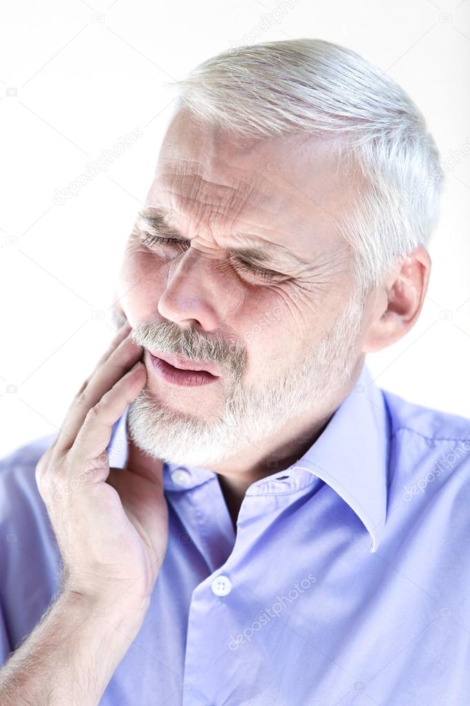Senior man portrait frown toothache