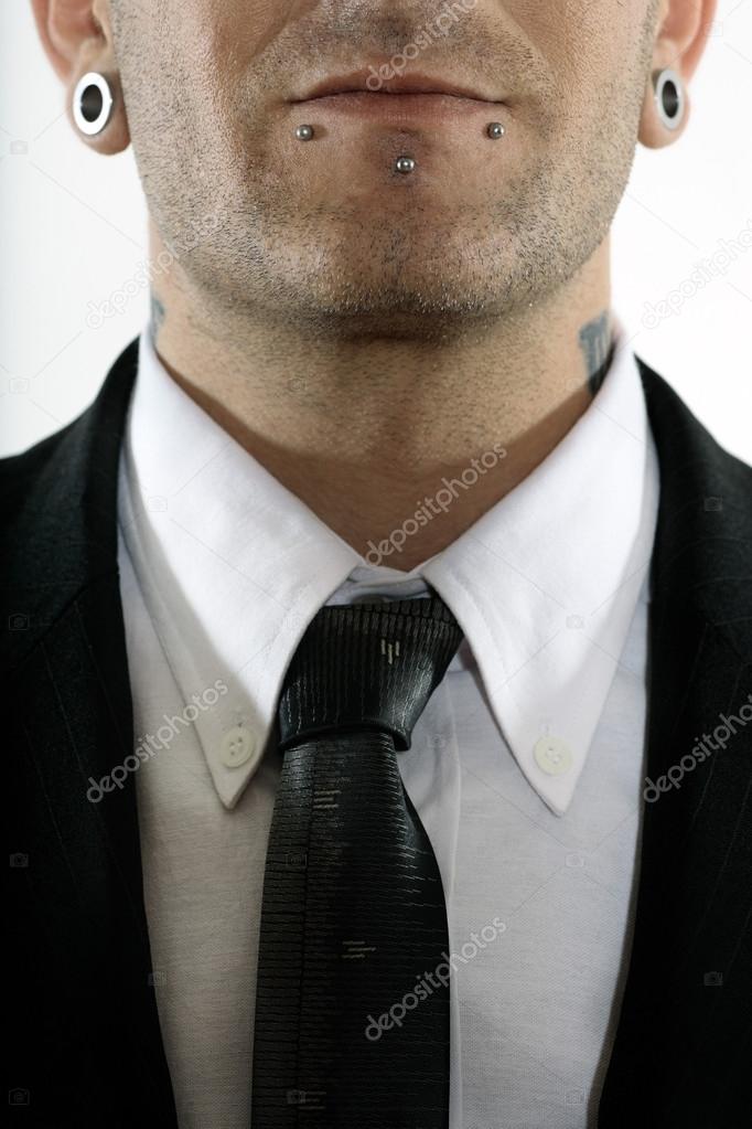 Businessman with piercing Stock Photo by ©STYLEPICS 19129947