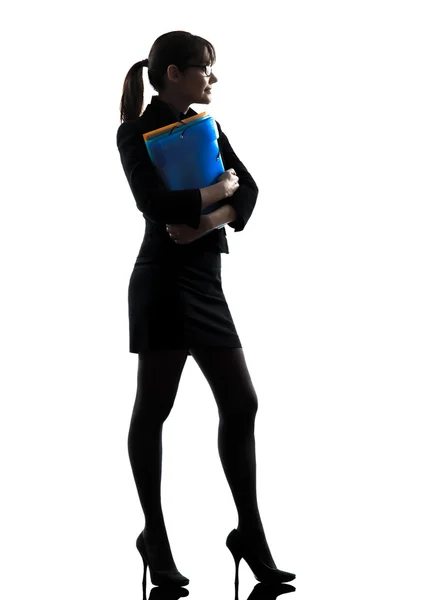 Business woman holding folders files standing silhouette — Stock Photo, Image