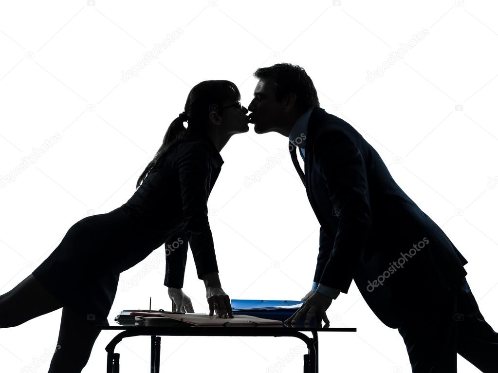 Business woman man couple lovers kissing silhouette