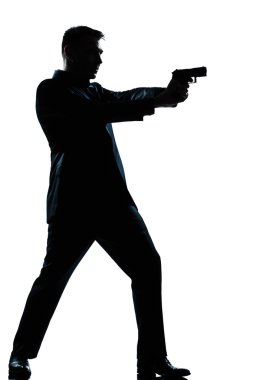 silhouette man full length shooting with gun clipart