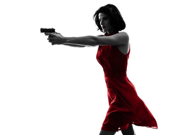 Sexy woman holding gun silhouette — Stock Photo, Image