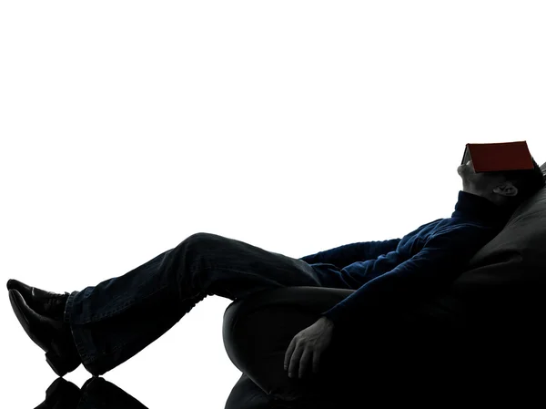 Man reading book silhouette full length — Stock Photo, Image