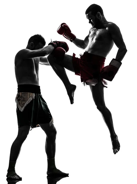 Two men exercising thai boxing silhouette — Stock Photo, Image