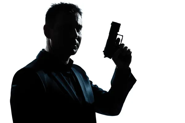 Silhouette man portrait with gun — Stock Photo, Image