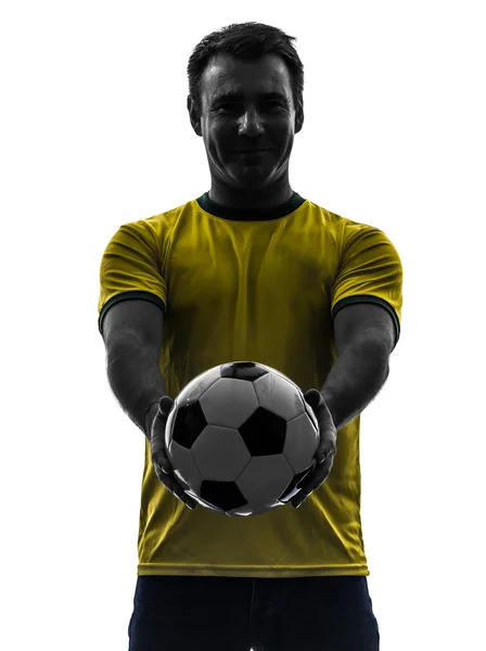 Man showing giving soccer football silhouette — Stock Photo, Image