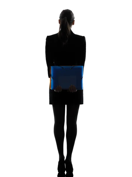 Business woman holding folders files standing silhouette — Stock Photo, Image