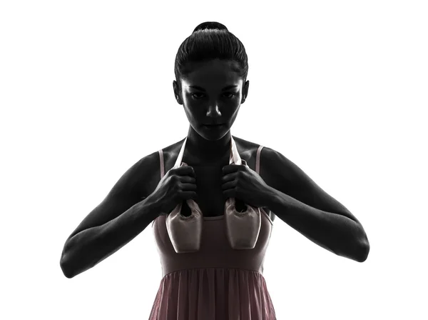 Bailarina mujer bailarina de ballet sosteniendo zapatos silueta —  Fotos de Stock
