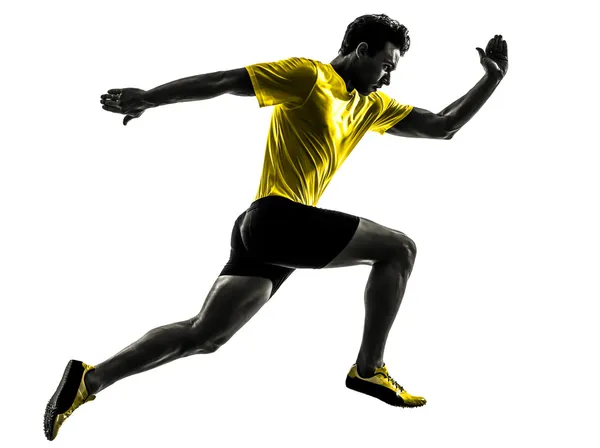 Jovem sprinter corredor correndo silhueta Fotografia De Stock