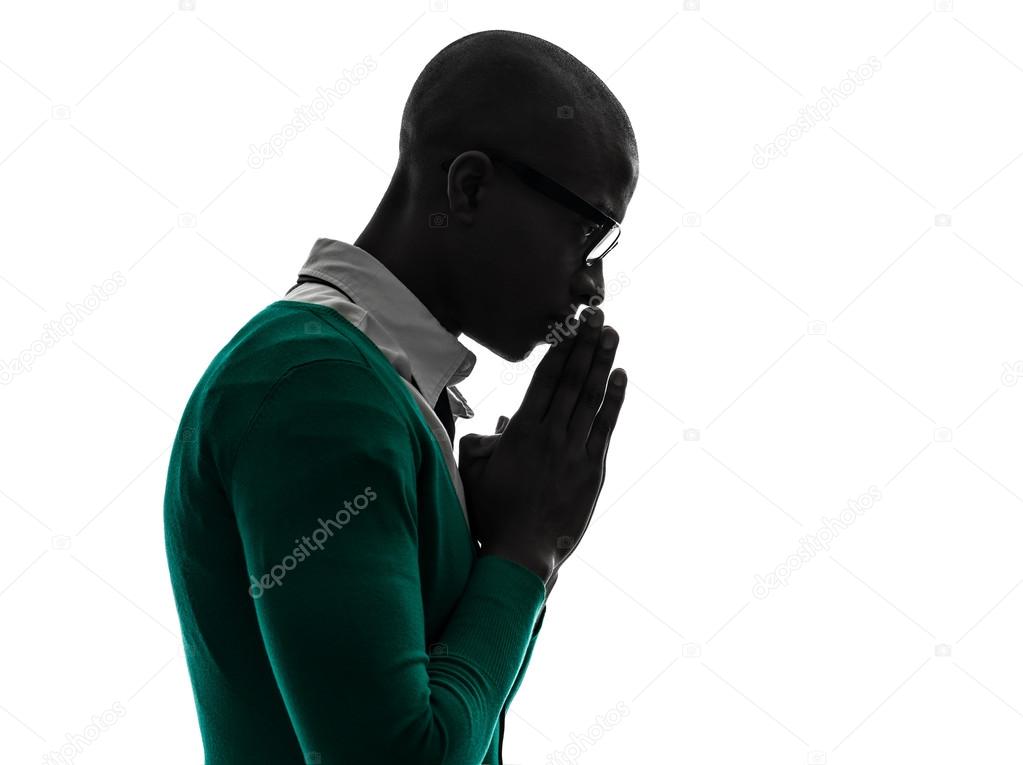 african black man thinking pensive praying silhouette