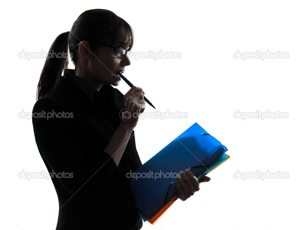 business woman focused holding folders files silhouette