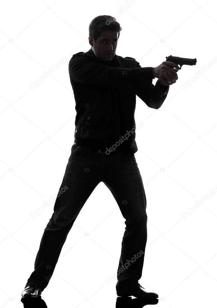 man killer policeman aiming gun standing silhouette