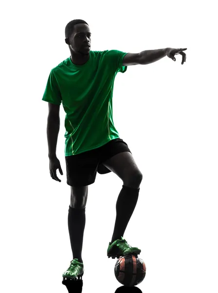 Afrykański mężczyzna piłka nożna gracz z rzutu wolnego sylwetka — Zdjęcie stockowe