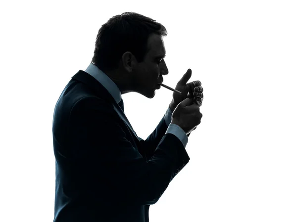 Man smoking cigarette silhouette — Stok fotoğraf