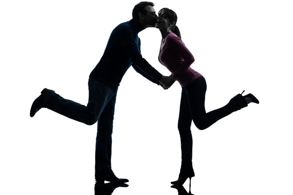 Couple woman man lovers kissing silhouette — Stock Photo, Image