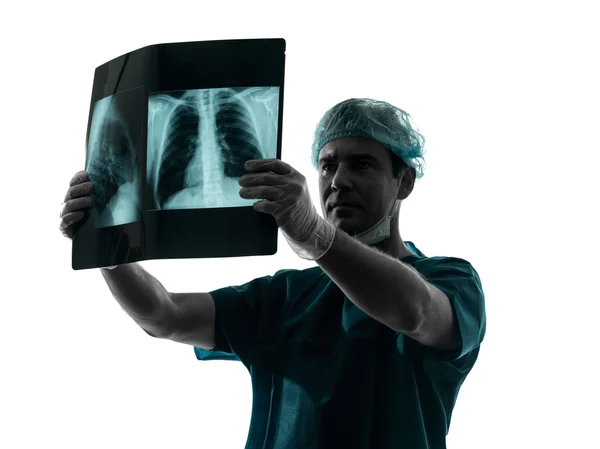 Doctor surgeon radiologist examining lung torso x-ray image — Stock Photo, Image